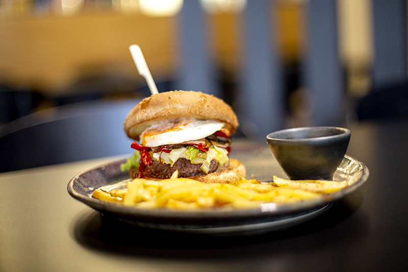 Slice of cake cut out of a chocolate crepe cake